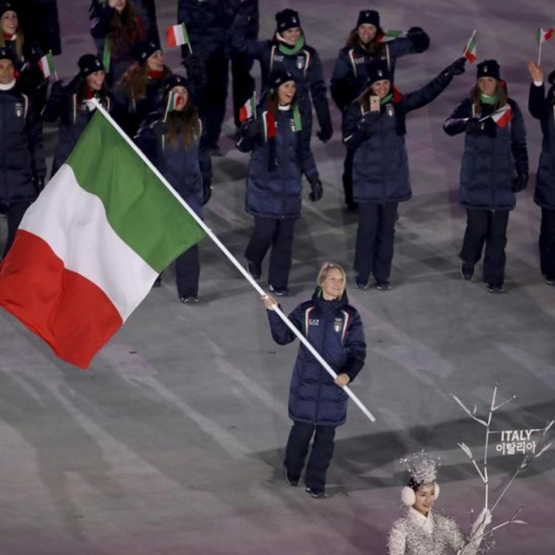 Arianna Fontana carries the flag of Italy during the opening ceremony of the 2018 Winter Olympics in Pyeongchang, South Korea, Friday, Feb. 9, 2018. (Sean Haffey/Pool Photo via AP) [CopyrightNotice: Copyright 2018 The Associated Press. All rights reserved]