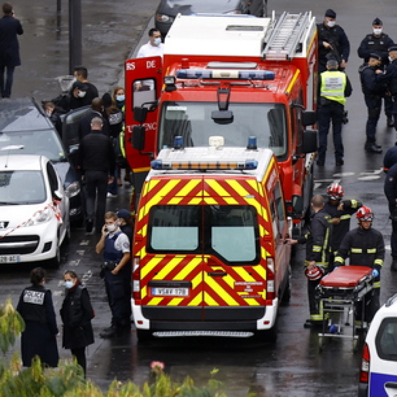 epa08696497 French rescue tam work on the site of the knife attack near the former Charlie Hebdo offices, in Paris, France, 25 September 2020, after two people have been wounded. According to recent reports, two assailants have been arrested in the Bastille area. EPA/IAN LANGSDON