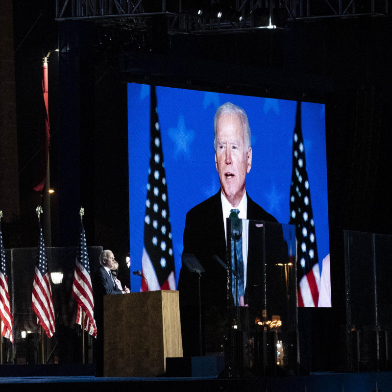 TOPSHOT - Democratic Presidential candidate Joe Biden speaks at the Chase Center in Wilmington, Delaware, on November 4, 2020. - President Donald Trump and Democratic challenger Joe Biden are squaring off for what could be a legal battle for the White House, running neck-and-neck in the electoral vote count, and several battleground states still in play on November 4. (Photo by JIM WATSON / AFP)