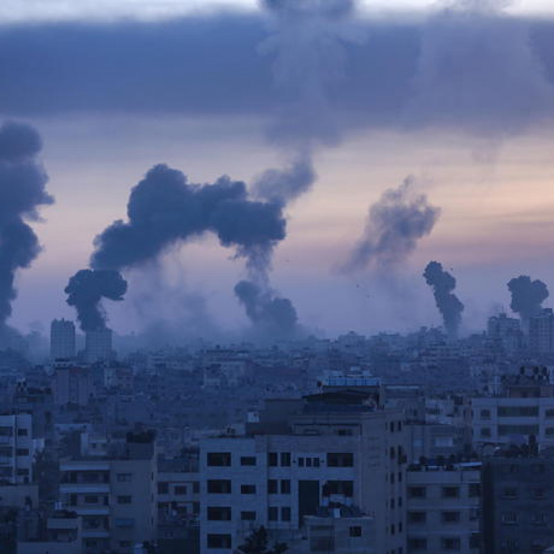 epa09192927 Smoke and flames rise after an Israeli airstrike on Gaza City, 12 May 2021. At least one woman was killed after 130 rockets, fired by Hamas from the Gaza strip, fell on Tel Aviv and neighbouring Israeli cities. A day earlier and in response to days of violent confrontations between Israeli security forces and Palestinians in Jerusalem, Palestinian militants factions in Gaza launched rocket attacks that killed two Israelis in the city of Ashkelon. Israel Defense Forces (IDF) said they hit over 100 targets in Gaza Strip during retaliatory strikes in the night between 10 and 11 May. The Health Ministry of Gaza strip said that at least 30 people, including children, were killed from the Israeli airstrikes. Israeli Prime Minister Benjamin Netanyahu said on 11 May that they will increase the rate and intensity of the strikes. EPA/HAITHAM IMAD