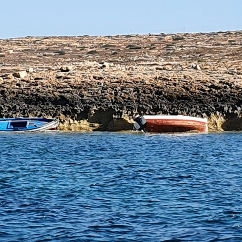 La polizia scientifica al porto di Lampedusa