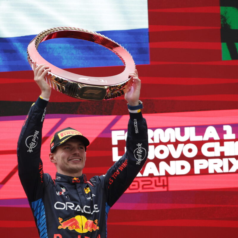 epa11291539 First placedd Red Bull Racing driver Max Verstappen of the Netherlands celebrates with his trophy on a podium during a prize presentation ceremony after the Formula One Chinese Grand Prix, in Shanghai, China, 21 April 2024. The 2024 Formula 1 Chinese Grand Prix is held at the Shanghai International Circuit racetrack on 21 April after a five-year hiatus. EPA/ANDRES MARTINEZ CASARES
