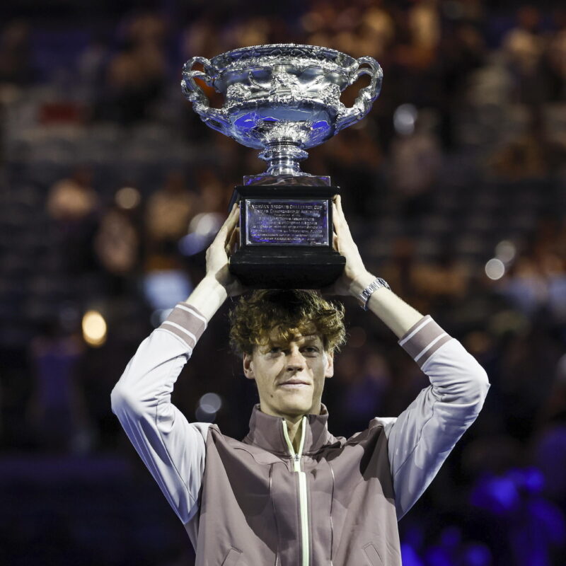 epa11110508 Jannik Sinner of Italy celebrates with the Norman Brookes Challenge Cup trophy after winning the Men's Singles final match against Daniil Medvedev of Russia at the 2024 Australian Open tennis tournament, in Melbourne, Australia, 28 January 2024. EPA/MAST IRHAM