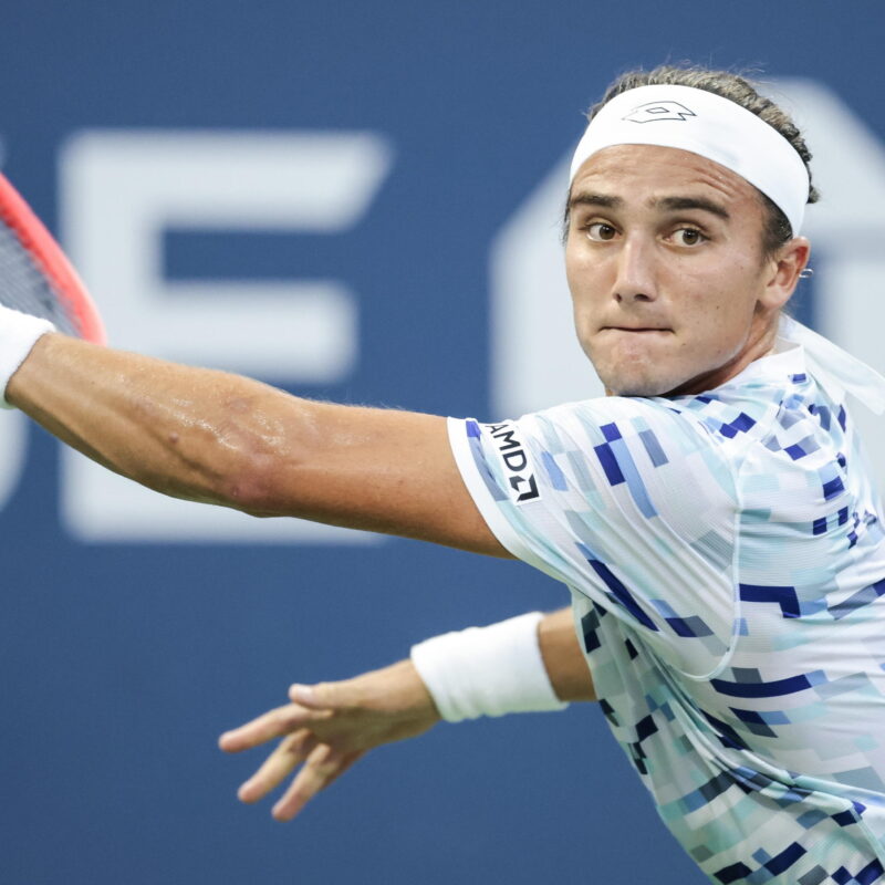 epa11567986 Mattia Bellucci of Italy hits a return to Stan Wawrinka of Switzerland (not pictured) during their first round match in the US Open Tennis Championships at the USTA Billie Jean King National Tennis Center in Flushing Meadows, New York, USA, 27 August 2024. The US Open tournament runs from 26 August through 08 September. EPA/JUSTIN LANE