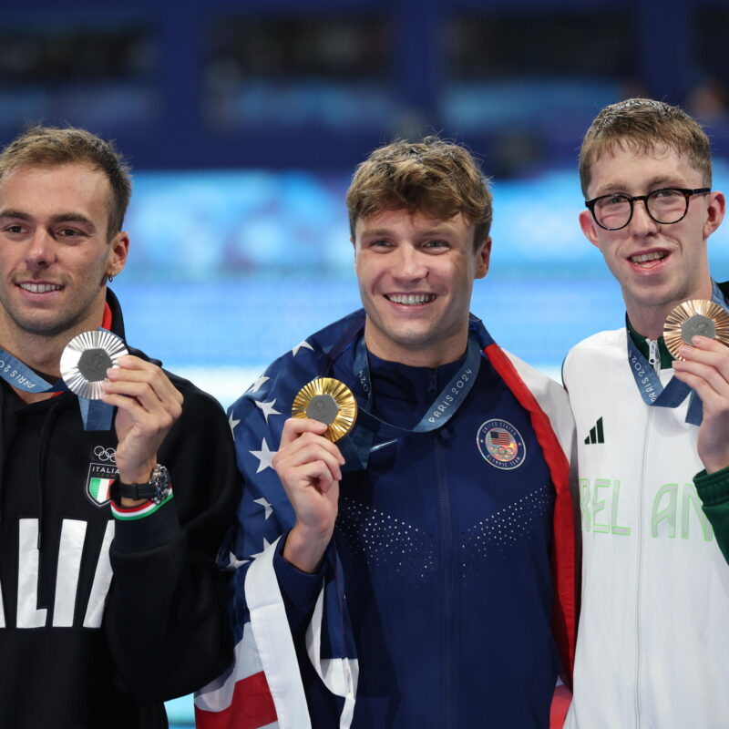 epa11526021 (L-R) Silver medalist Gregorio Paltrinieri of Italy, gold medalist Bobby Finke of USA, and bronze medalist Daniel Wiffen of Ireland pose for photos after the medal ceremony for the Men 1500m Freestyle final of the Swimming competitions in the Paris 2024 Olympic Games, at the Paris La Defense Arena in Paris, France, 04 August 2024. EPA/RITCHIE B. TONGO