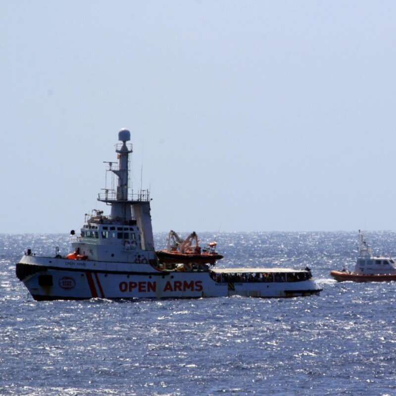 The Open Arms ship with 147 migrants on board arrived at dawn this morning in the immediate vicinity of Lampedusa, southern Italy, 15 August 2019. Several patrol boats of the Italian finance guard and the harbor master's office are monitoring the movements of the Spanish NGO boat that headed towards the island of Pelagie, escorted by two military ships, after the Lazio Regional Administrative Court accepted its appeal, suspending the ban on entry into Italian waters ordered by Italian Interior Minister Matteo Salvini. ANSA/ ELIO DESIDERIO