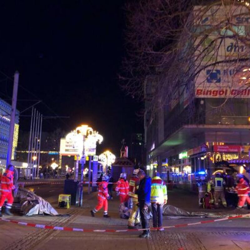 Police and rescue personnel cordon off the area next to a Christmas market, where a car crashed into a crowd killing and injuring people, according to media, on December 12, 2024 in Magdeburg. (Photo by Doerthe HEIN / DPA / AFP) / Germany OUT