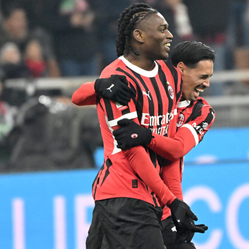 AC Milans forward Rafael Leao (L) celebrates after scoring with teammate during the Coppa Italia soccer match between AC Milan and Sassuolo at the GIuseppe Meazza Stadium in Milan, Italy, 3 December 2024. ANSA/DANIEL DAL ZENNARO