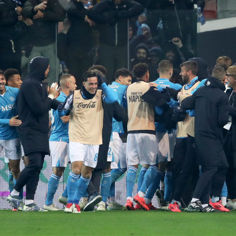 Napolis Frank Anguissa (C) celebrated by his teammates after scoring the goal during the Italian Serie A soccer match Udinese Calcio vs SSC Napoli at the Friuli - Bluenergy Stadium in Udine, Italy, 14 December 2024. ANSA / GABRIELE MENIS