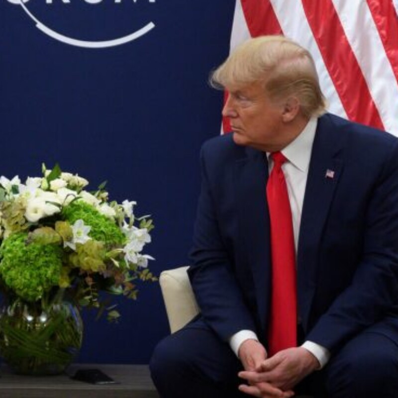 US President Donald Trump speaks with European Commission President Ursula von der Leyen prior to their meeting at the World Economic Forum in Davos, on January 21, 2020. (Photo by JIM WATSON / AFP)