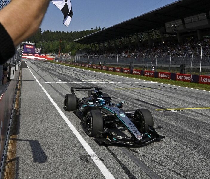 https://assets.gds.it/2026/06/Russel-vince-il-Gp-dAustria-703x600.jpeg